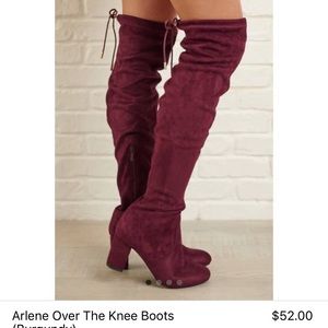 Burgundy over the knee boots.